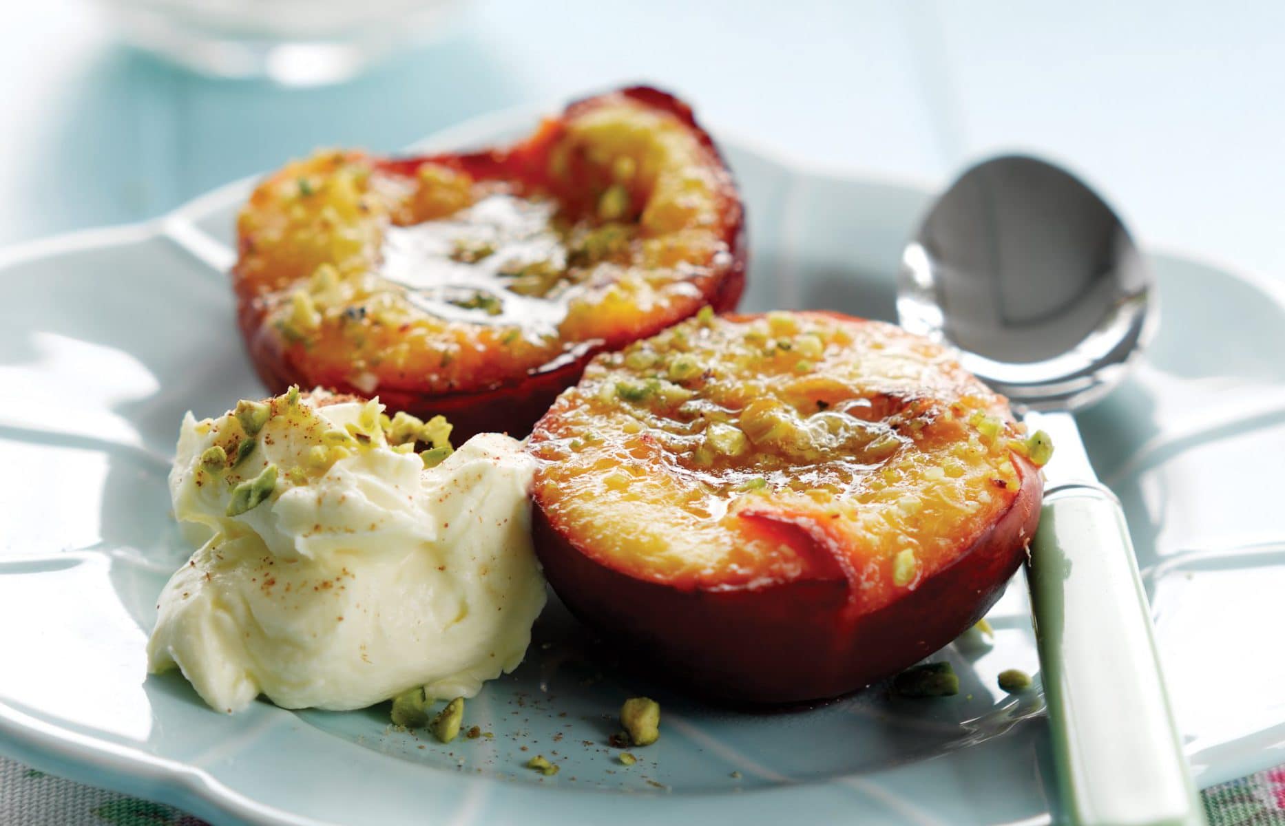 Baked stone fruit with pistachios