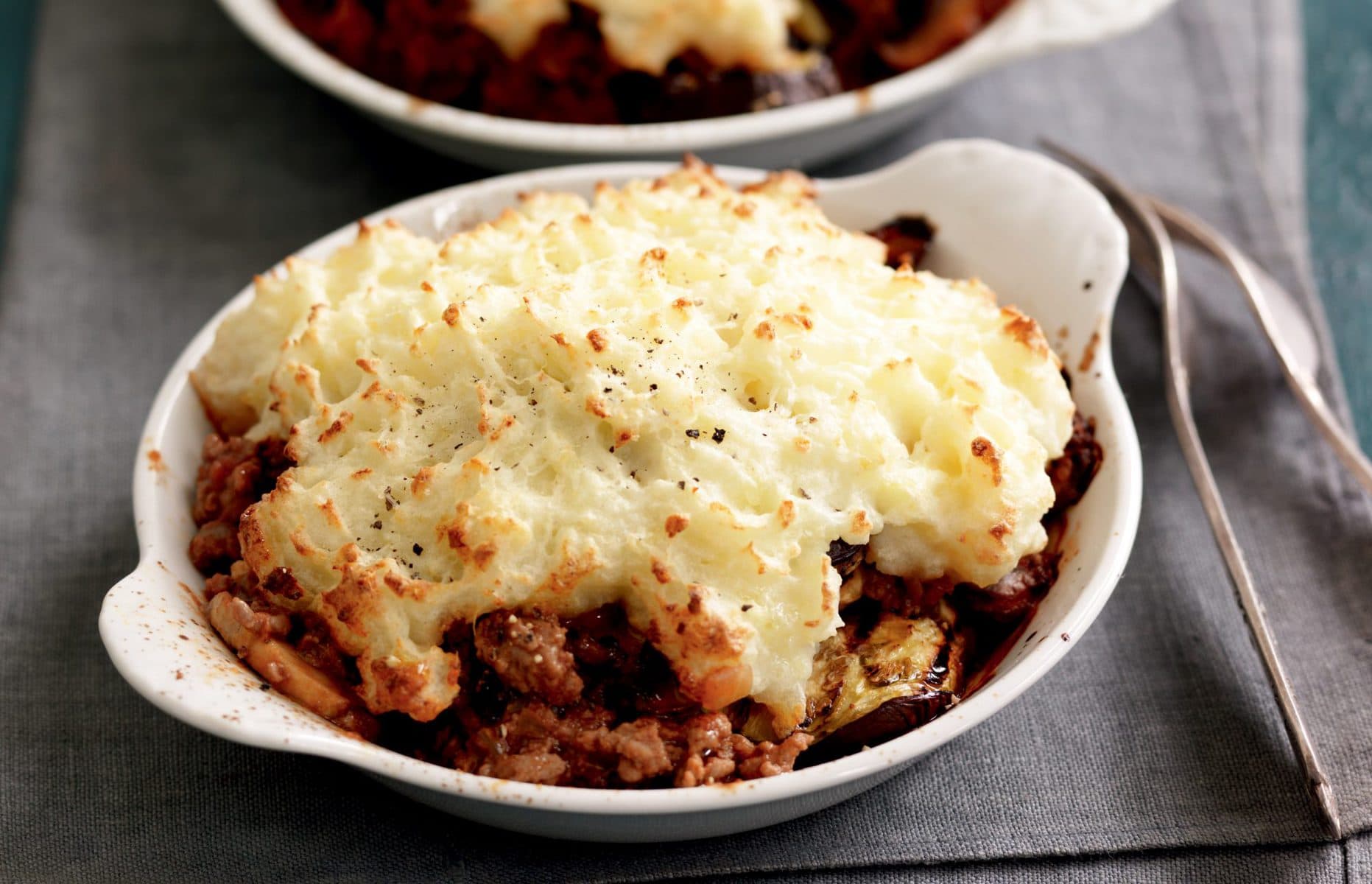 Beef and eggplant pies with parmesan and potato topping