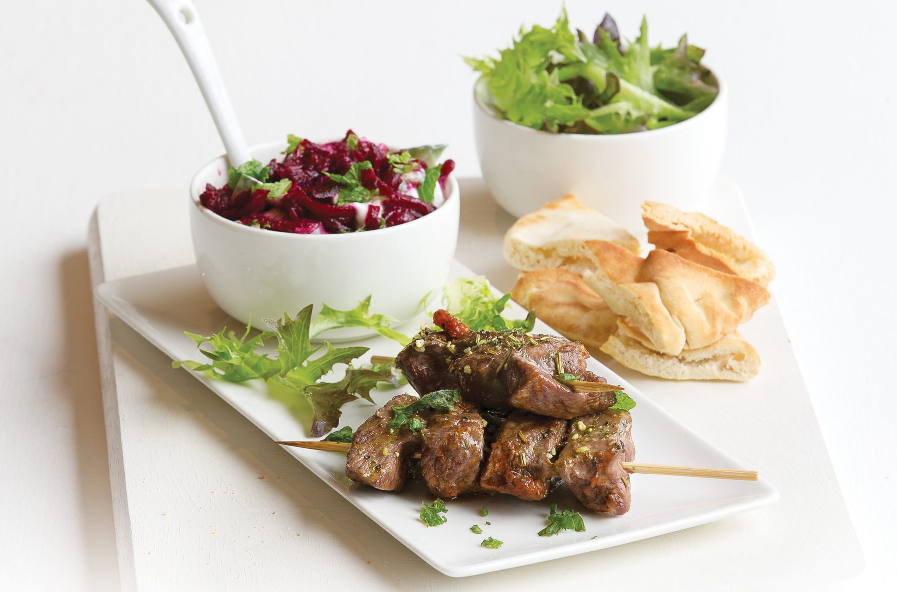 Beef kebabs with minty beetroot dip