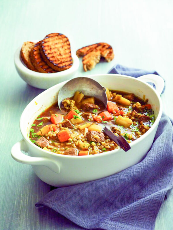 Beef and beer stew with crusty garlic bread