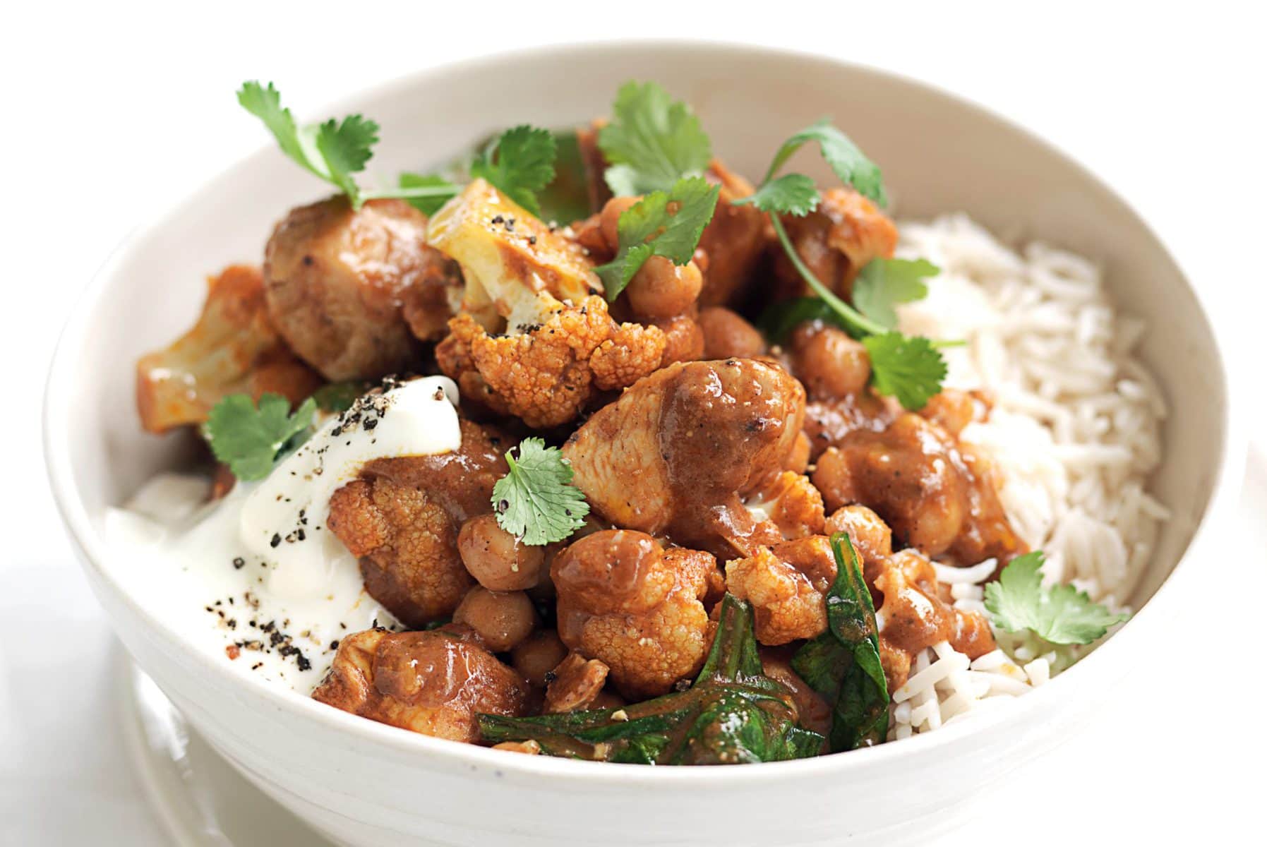 Butter chicken with chickpeas, spinach and yoghurt