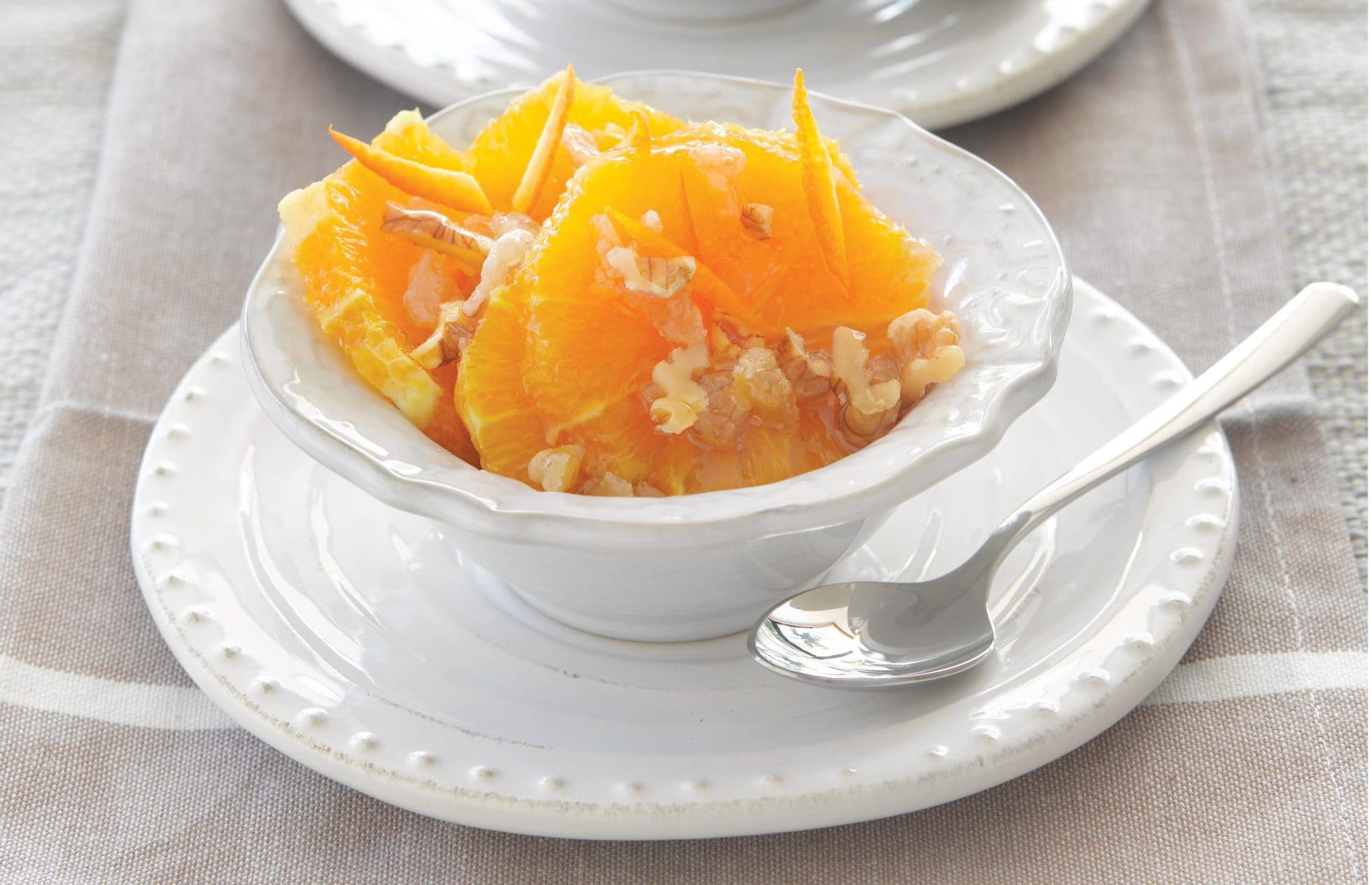 Caramelised oranges with ginger and walnuts