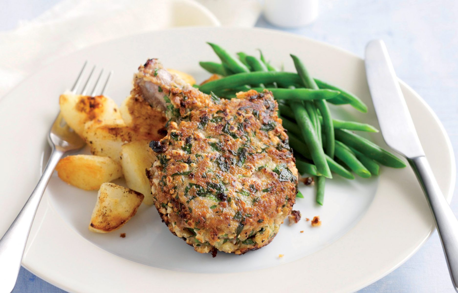 Cashew-coated lamb with sautéed potatoes