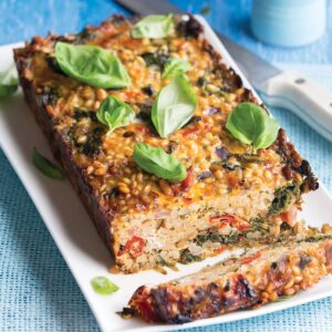 Cheesy pine nut barley loaf with warm baby vegetable salad