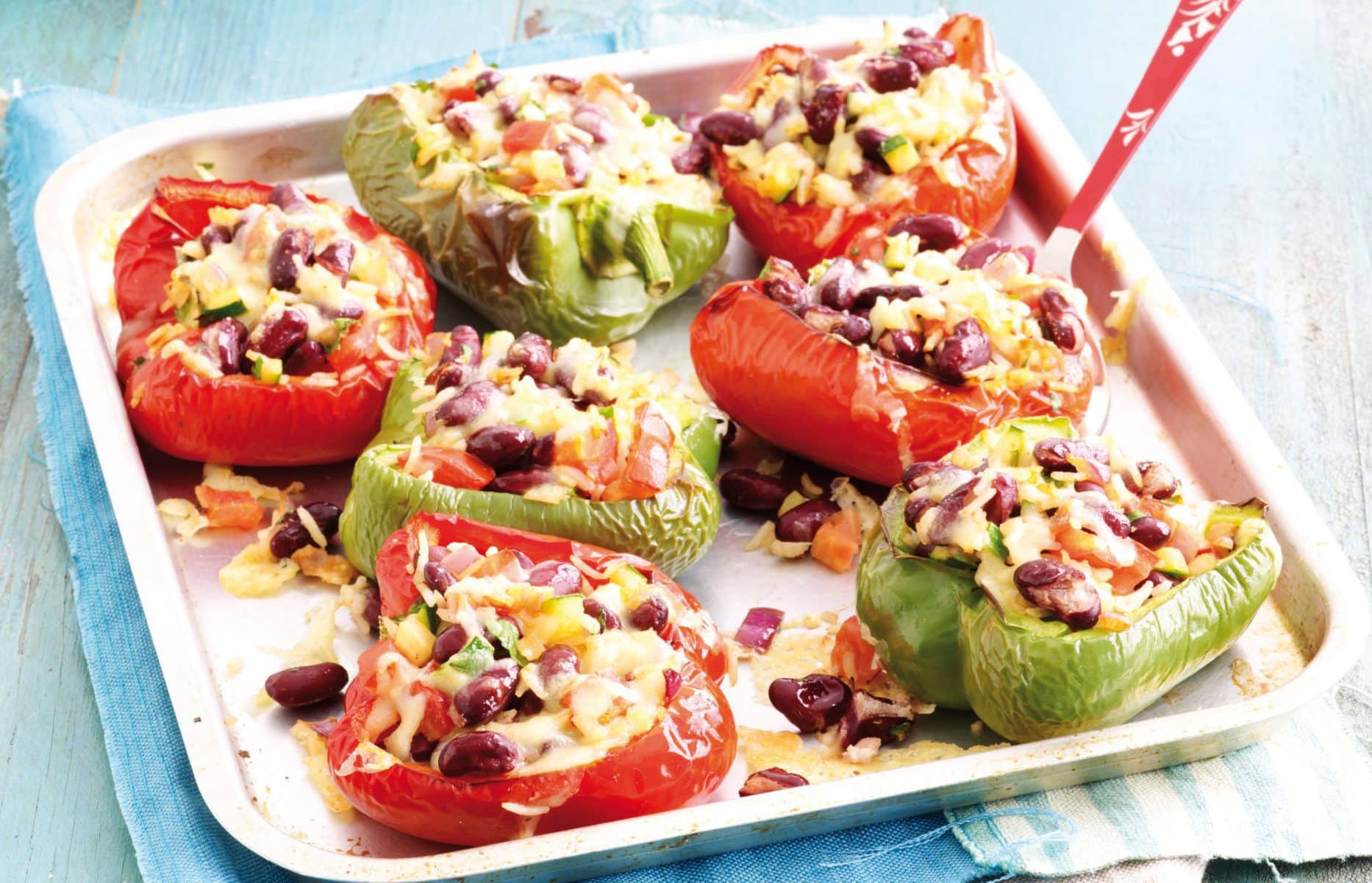 Cheesy rice and bean-stuffed capsicums