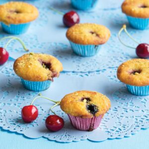 Cherry almond fairy cakes with pistachio dust
