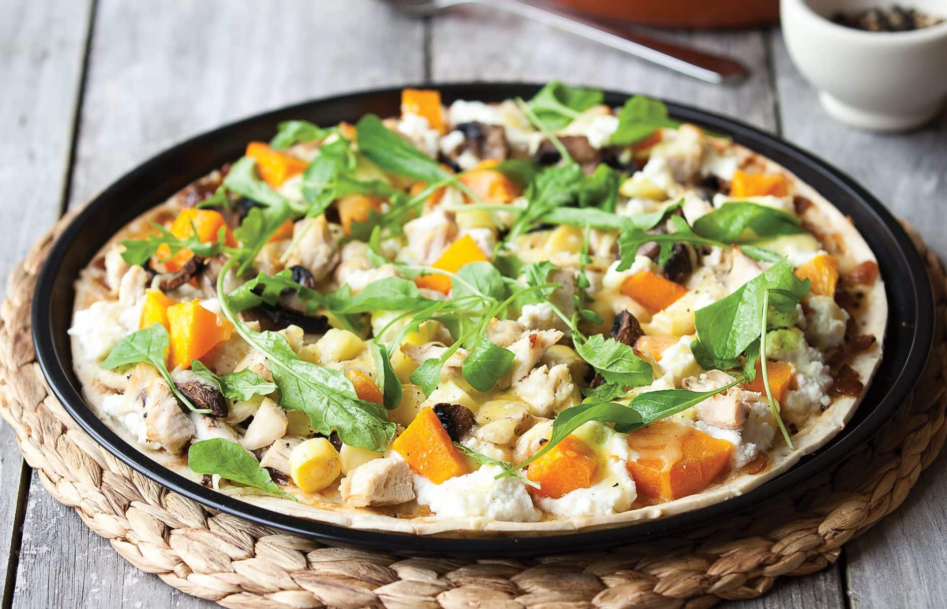Chicken, pumpkin and rocket pizza