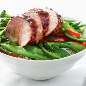 Chinese barbecued pork with stir-fried greens