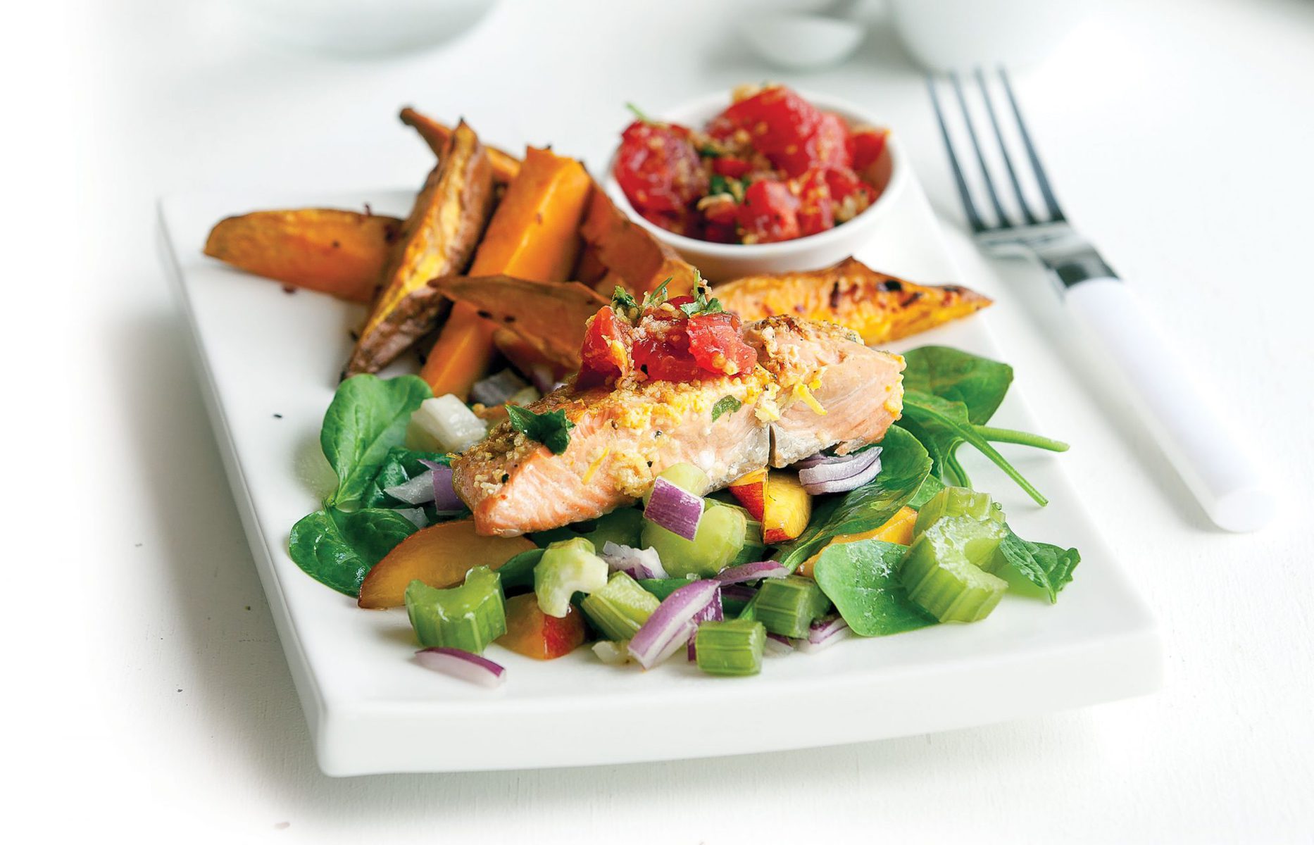 Chermoula-topped salmon with kumara fries and salad