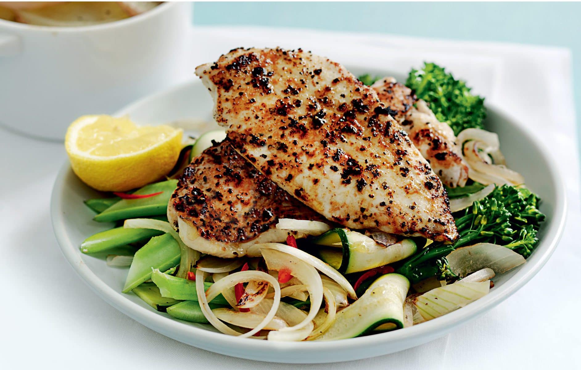 Grilled chicken with potato gratin and garlicky greens