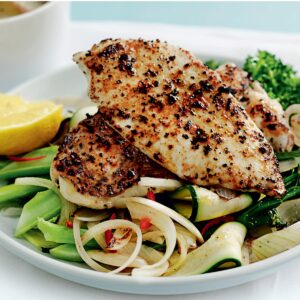 Grilled chicken with potato gratin and garlicky greens