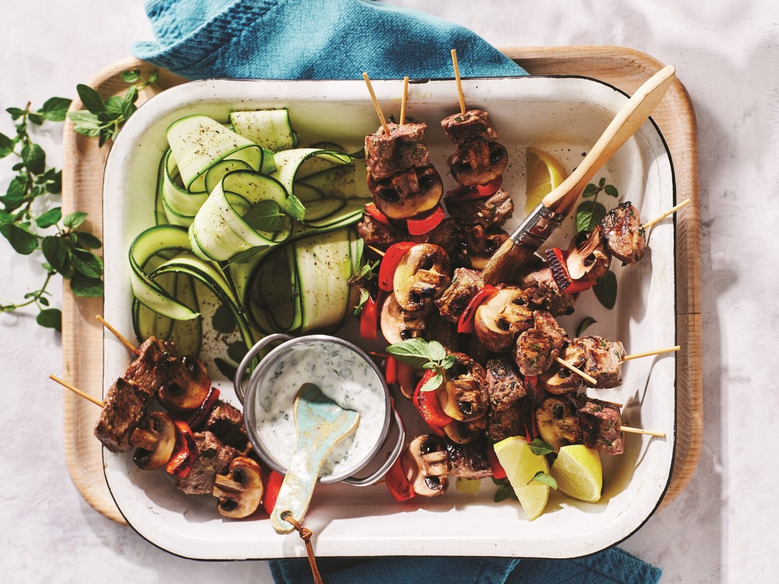 Lamb kebabs with zucchini salad