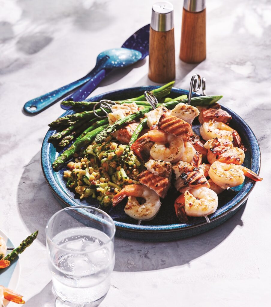 Seafood skewers with lentil salad