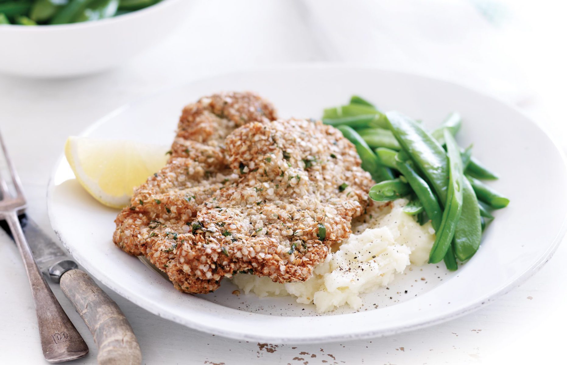 Herb-crumbed beef with creamy mash