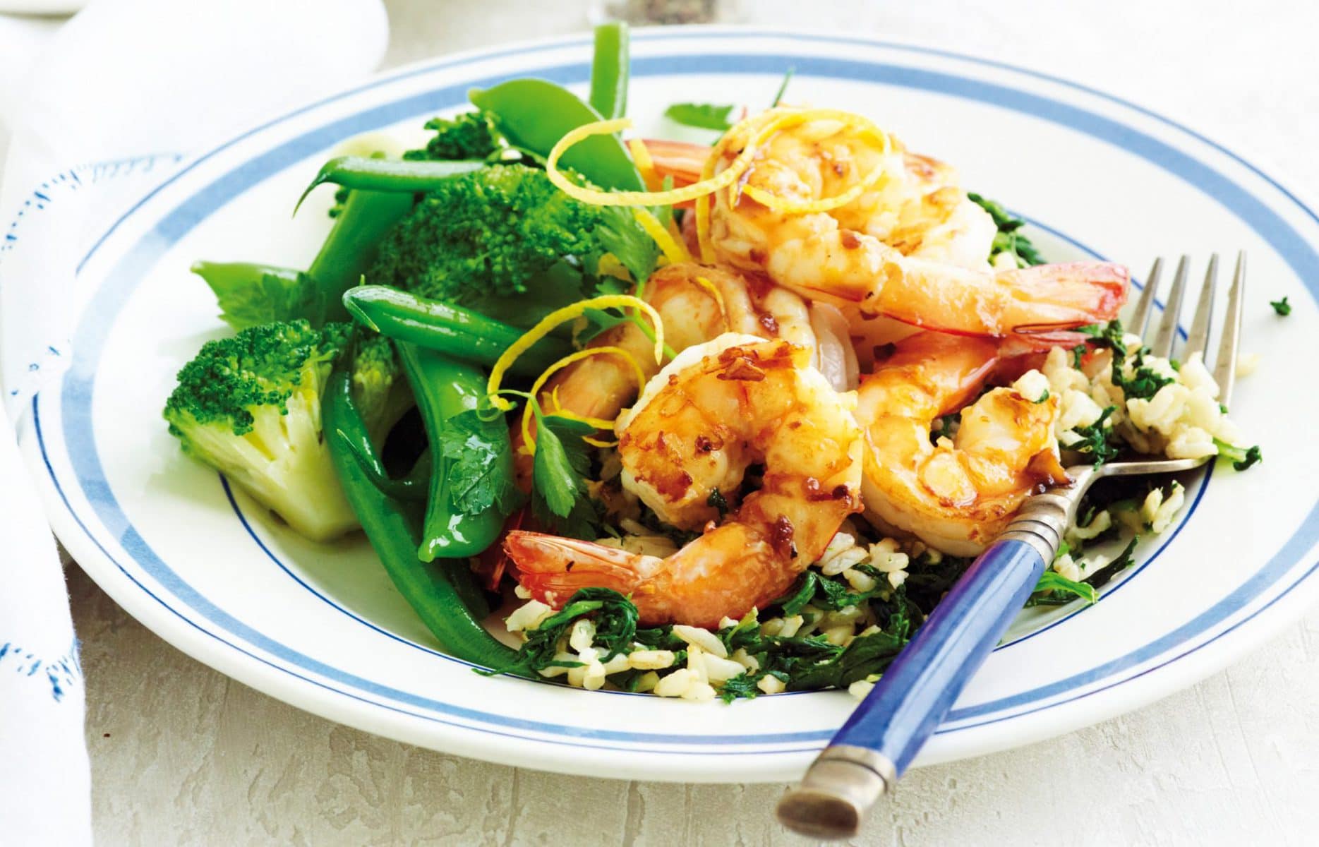 Lemon prawns with spinach rice