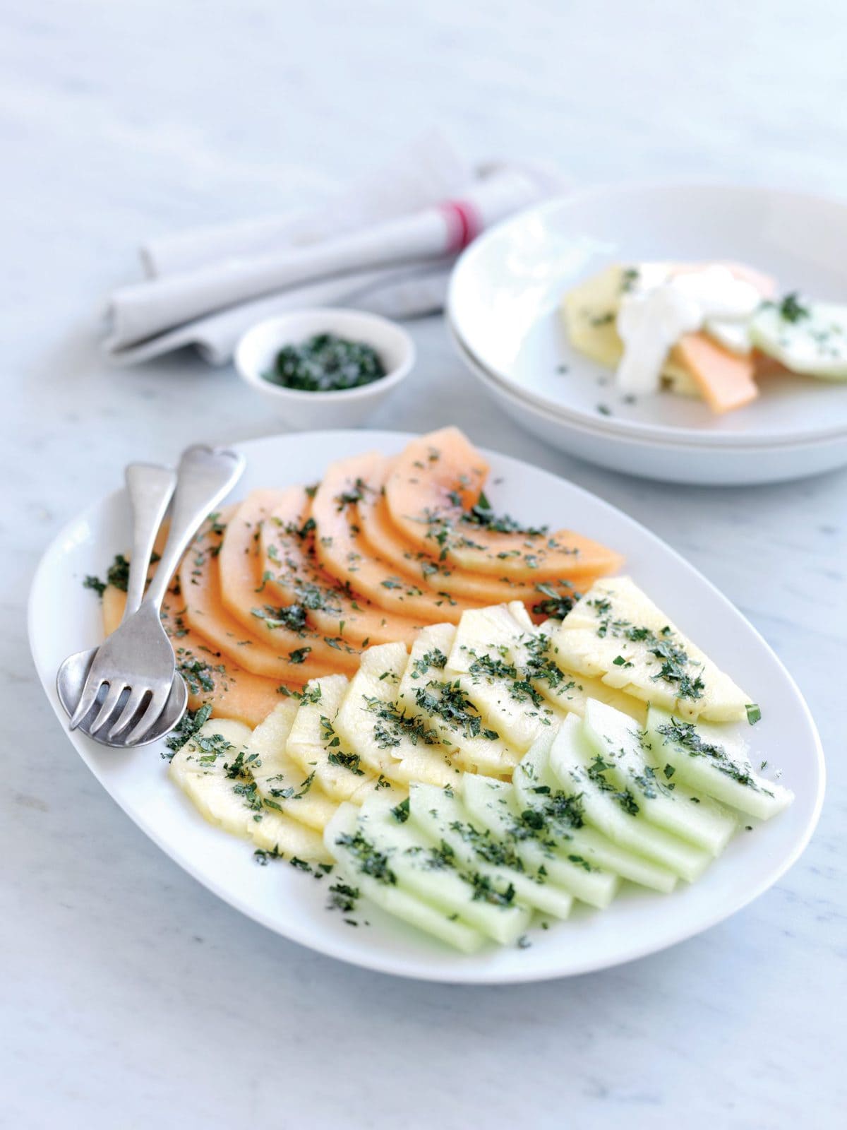 Pineapple and melon with mint sugar