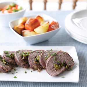 Roast lamb with fruity garlic stuffing