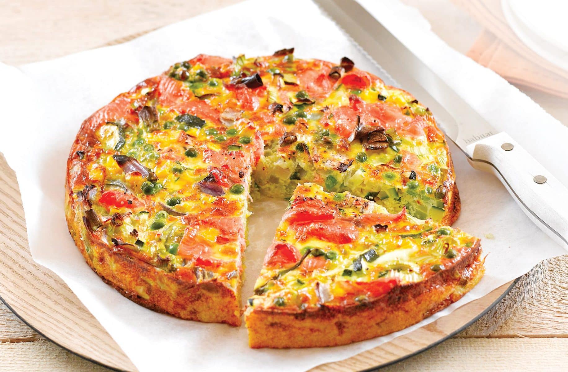 Salmon and garden greens self-crusting quiche