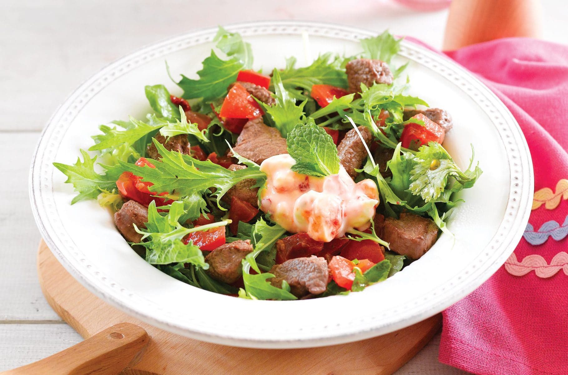 Seared lamb salad with chilli and feta yoghurt dressing