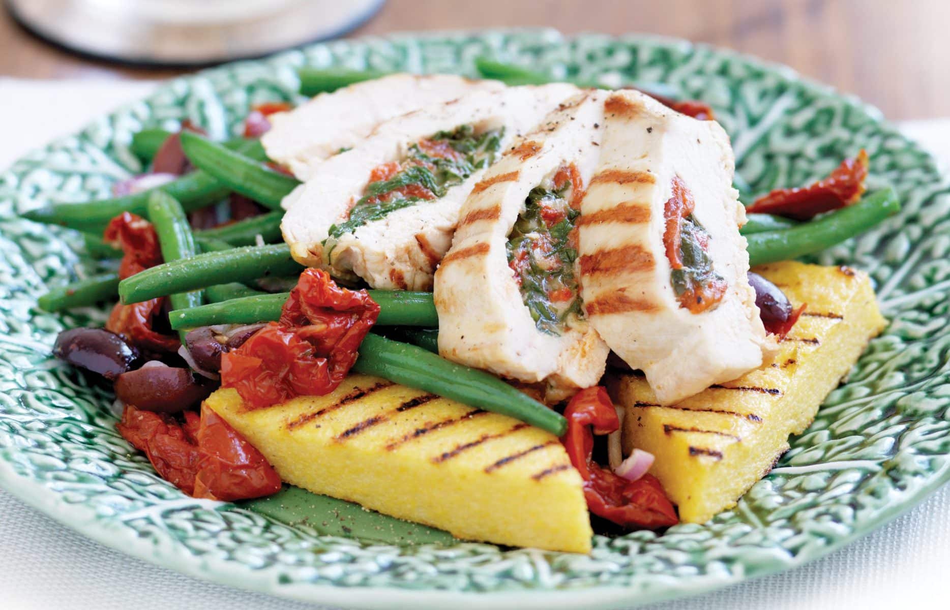 Spinach and capsicum-filled chicken with grilled polenta