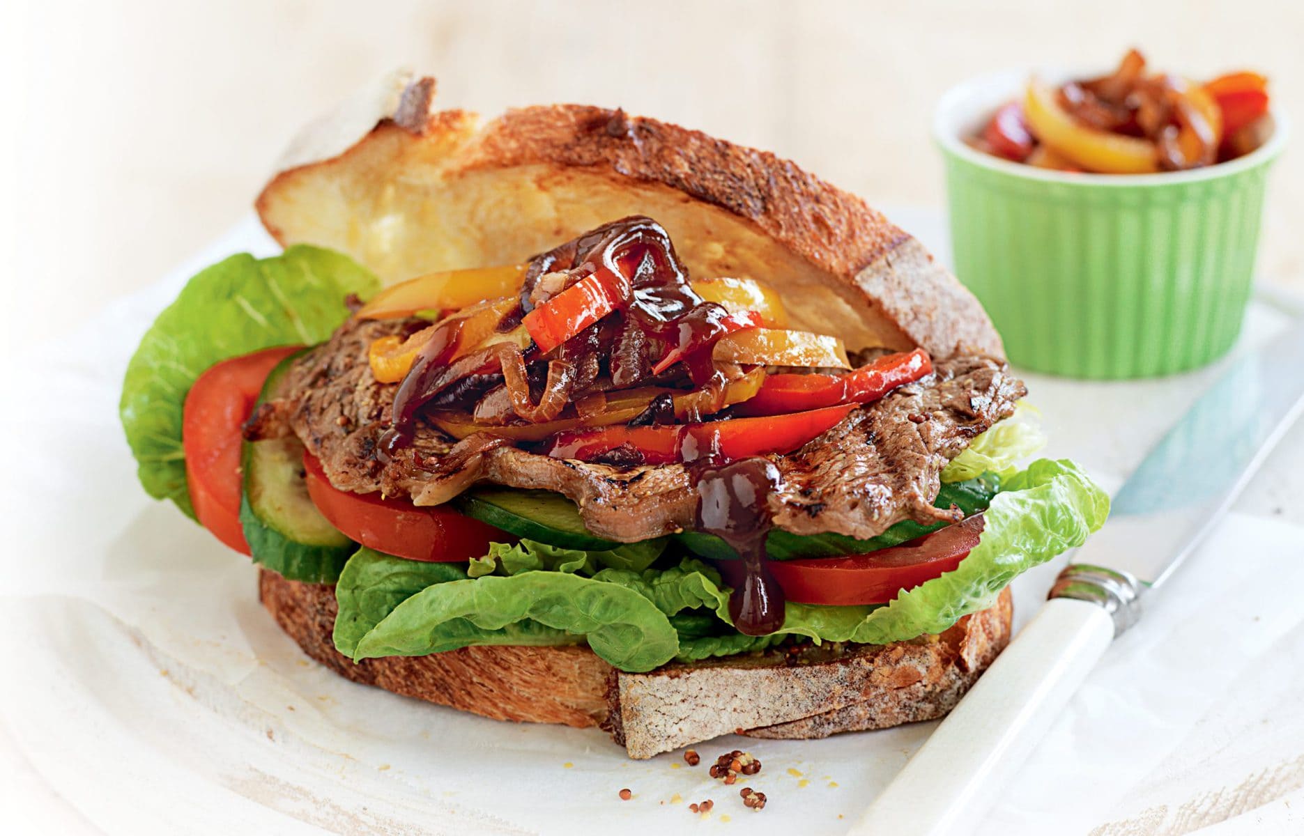 Steak sandwich with caramelised onion and capsicum