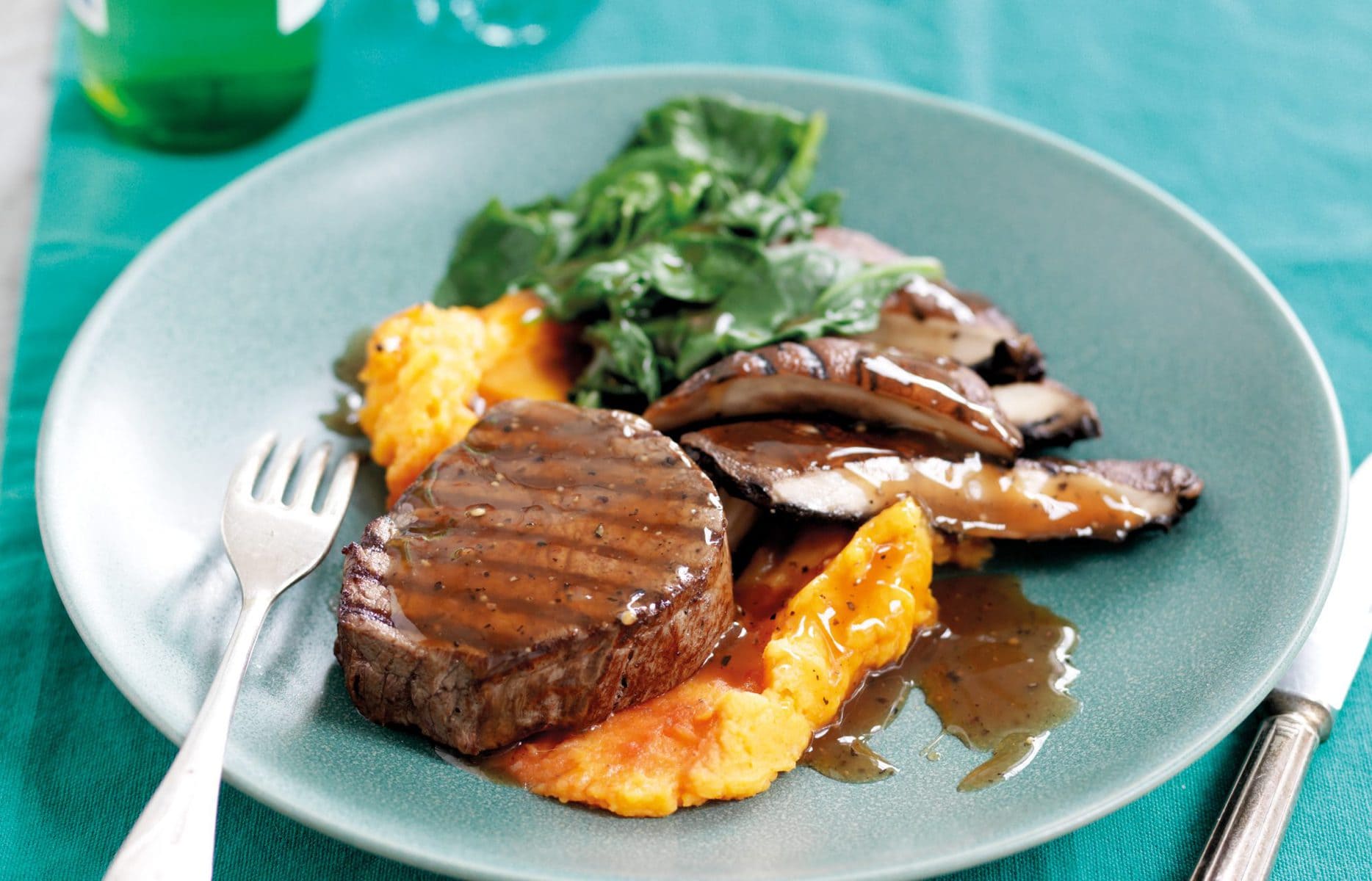 Steak with portobello mushrooms and pepper sauce