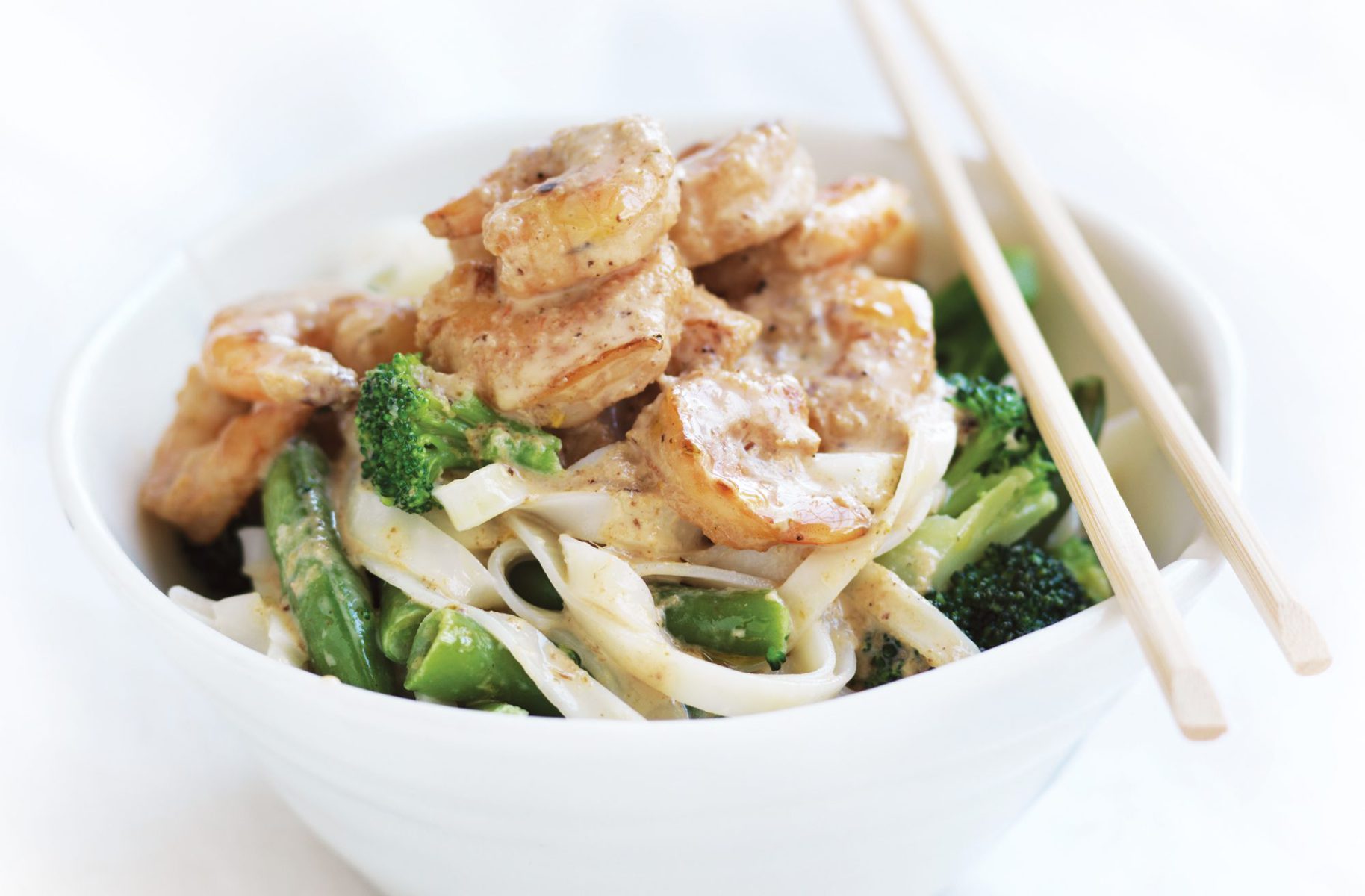 Green curry prawns with coconut rice noodles