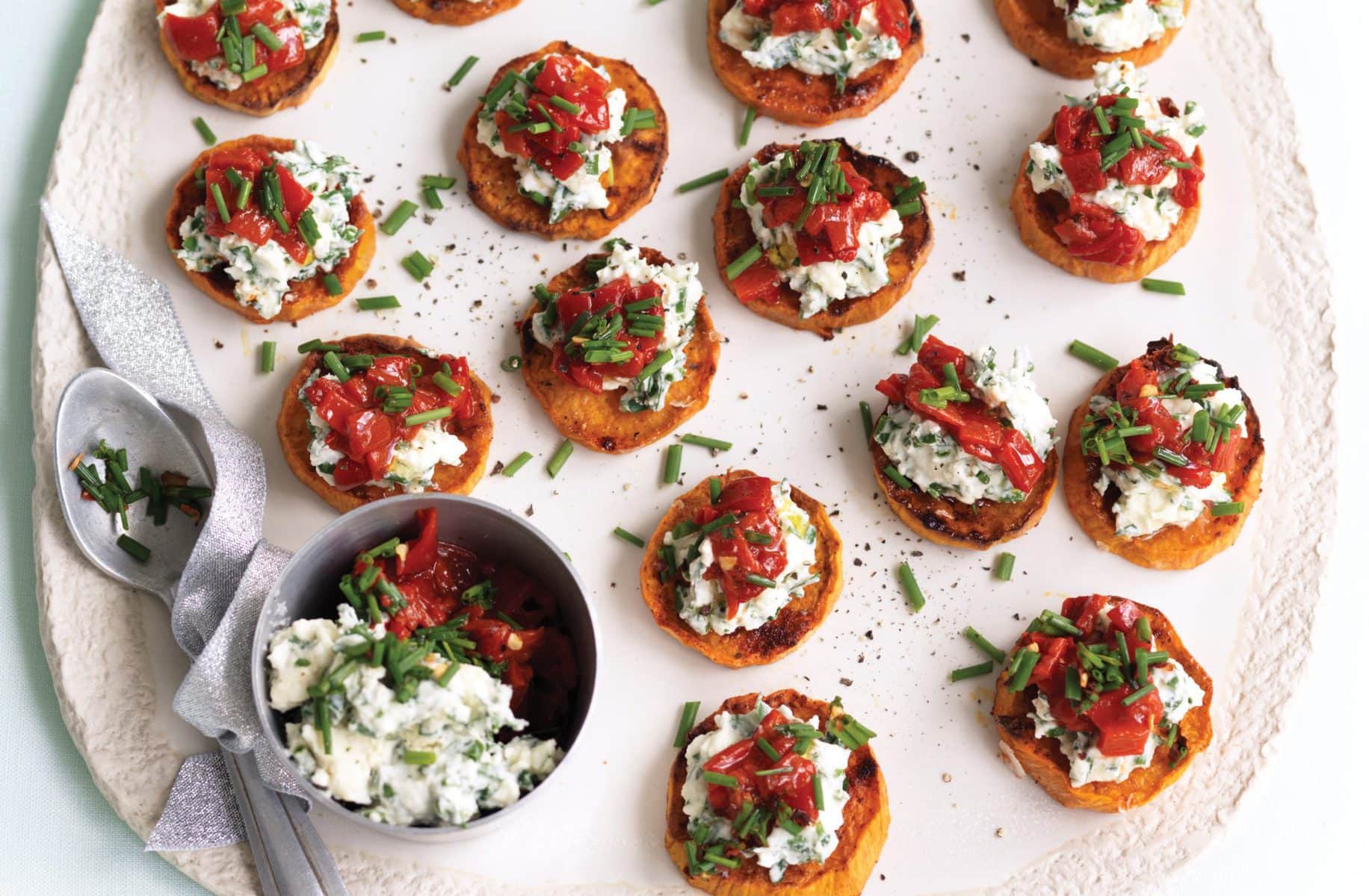 Roasted kumara with herb ricotta and capsicum salsa