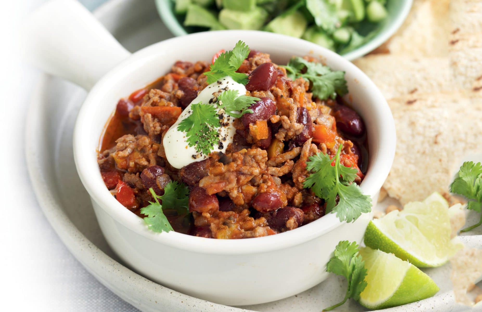 Chilli con carne with avocado salsa