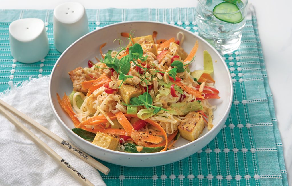 Cold rice noodle salad with crunchy veges, tempeh and honey-peanut dressing