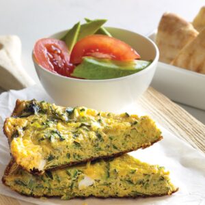 Courgette, mint and feta omelette with pita wedges