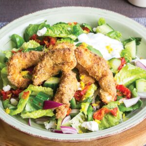 Crispy fish bites with salad and lemony dressing