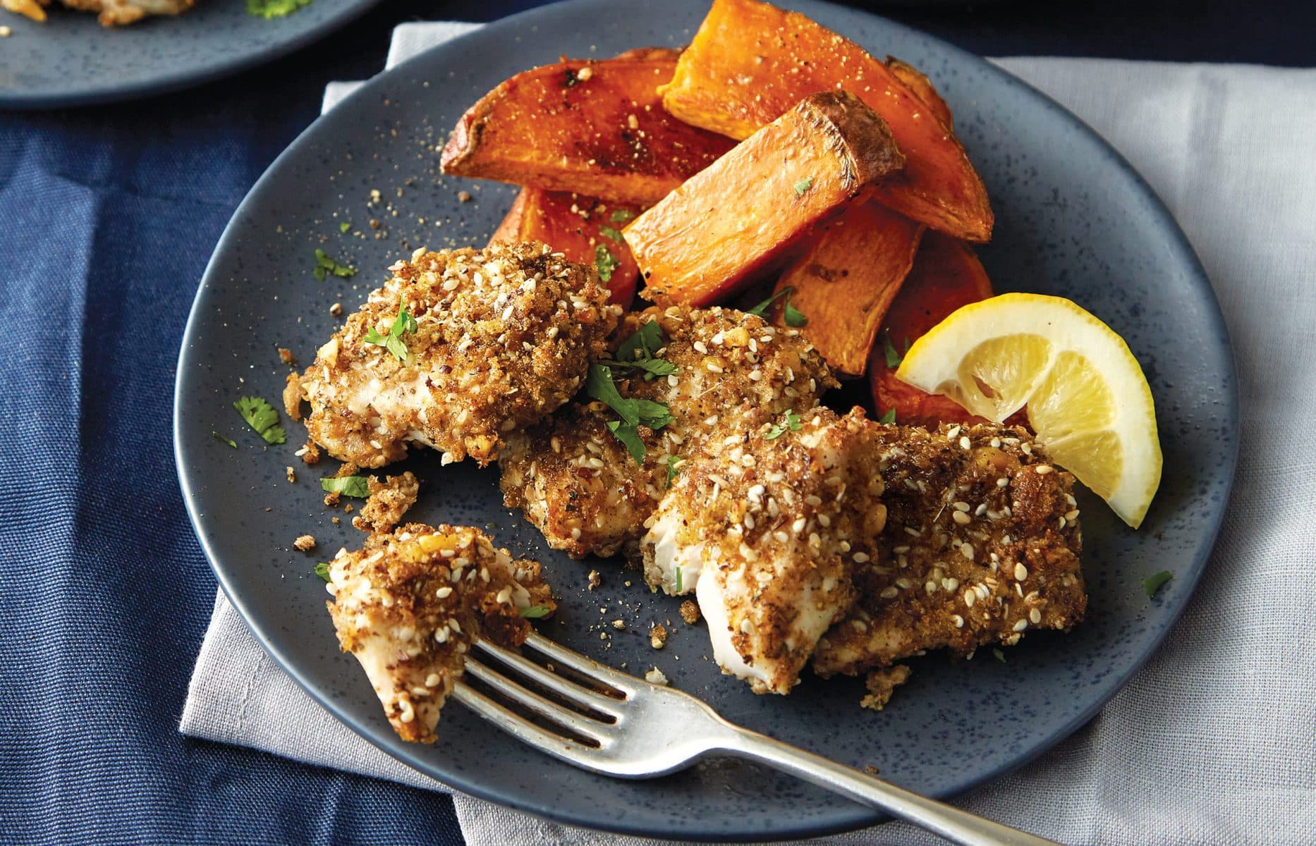 Crispy fish bites with wedges and slaw