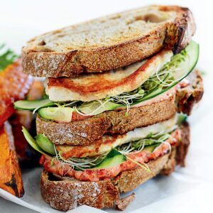 Grilled chicken club sandwich with kumara wedges