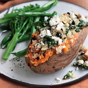 Kumara with quinoa, silver beet, almonds and feta
