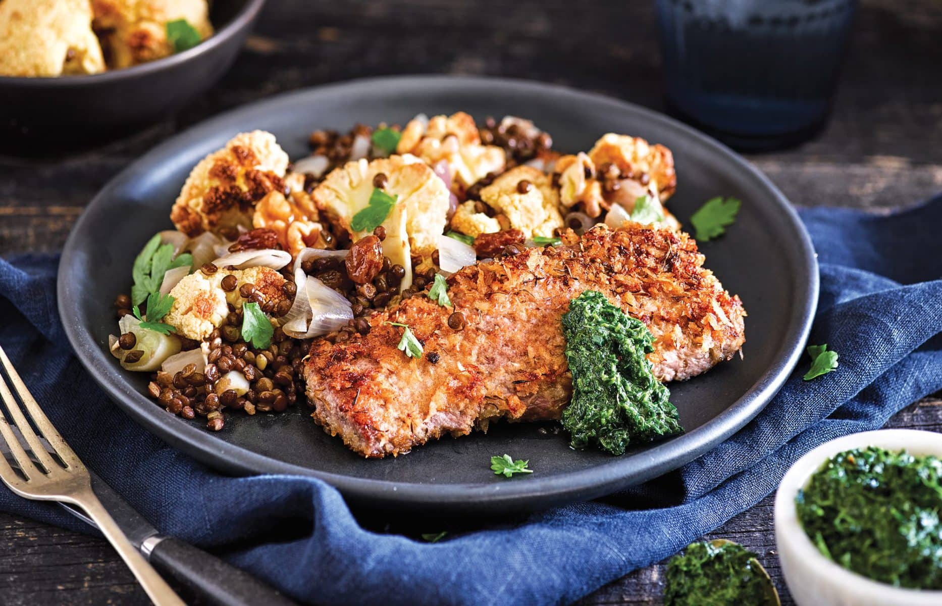 Lamb schnitzel with cauliflower and lentil salad and mint pesto