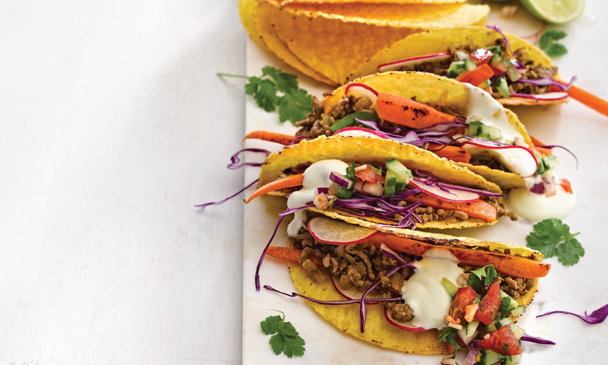 Lamb tacos with yoghurt drizzle