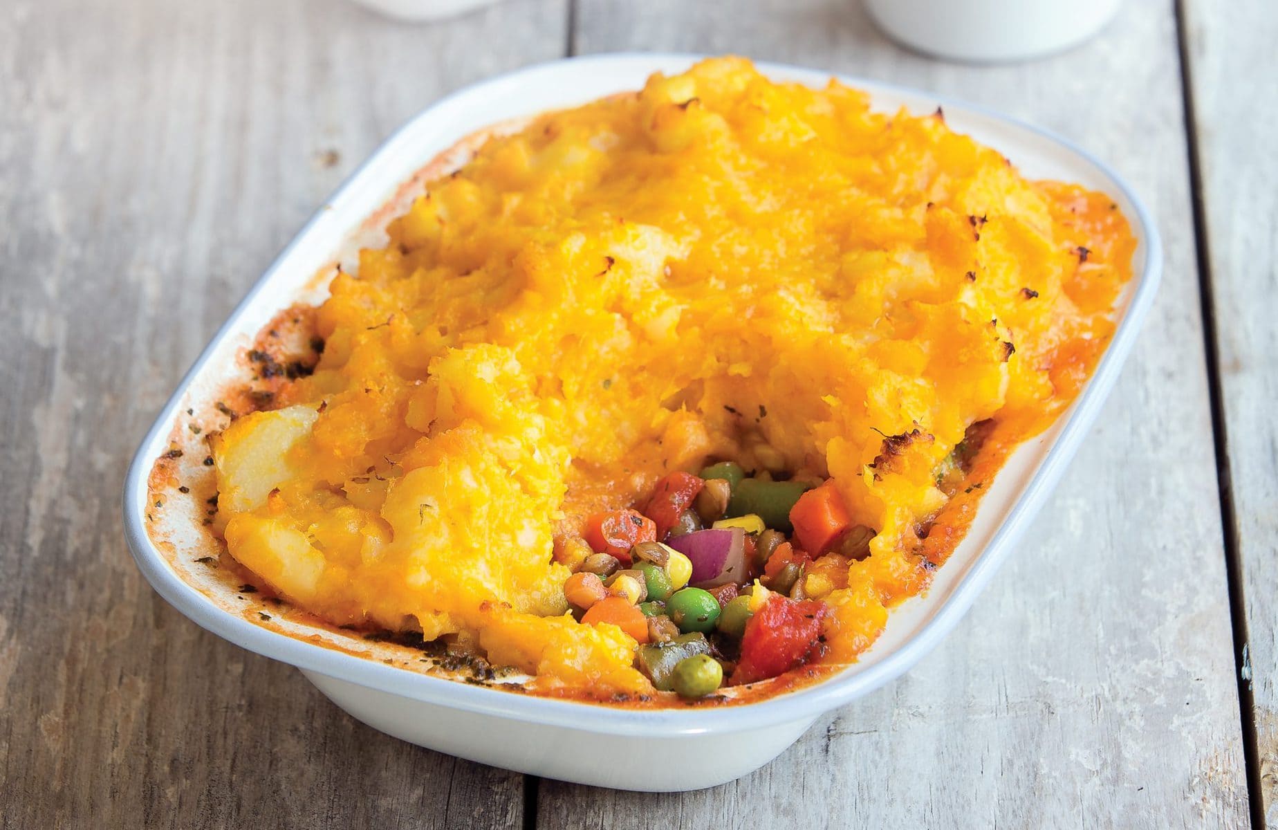 Lentil and tomato pie with golden mash