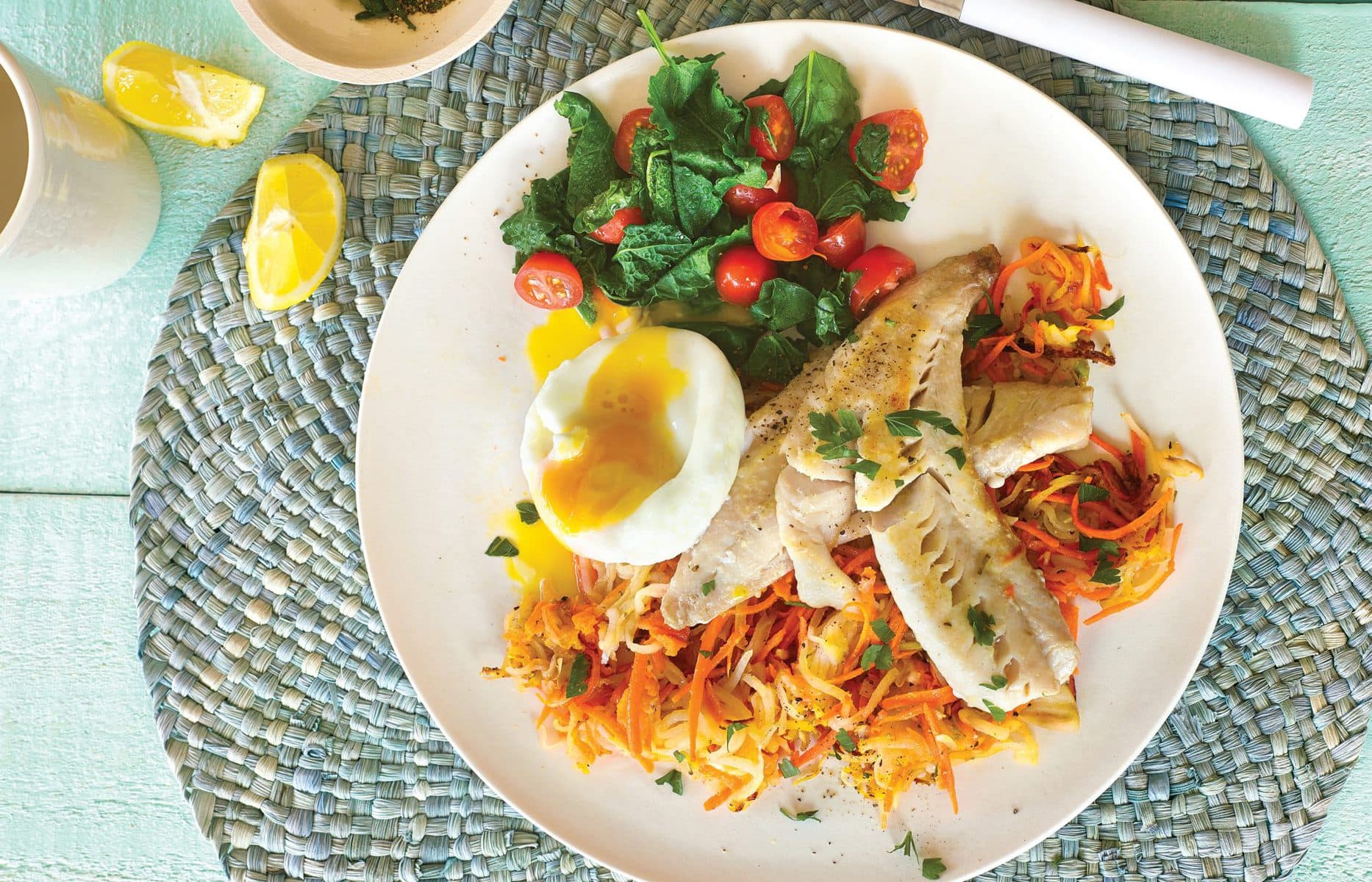 Pan-fried fish with poached egg on potato rosti