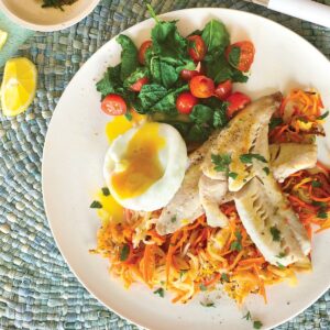 Pan-fried fish with poached egg on potato rosti