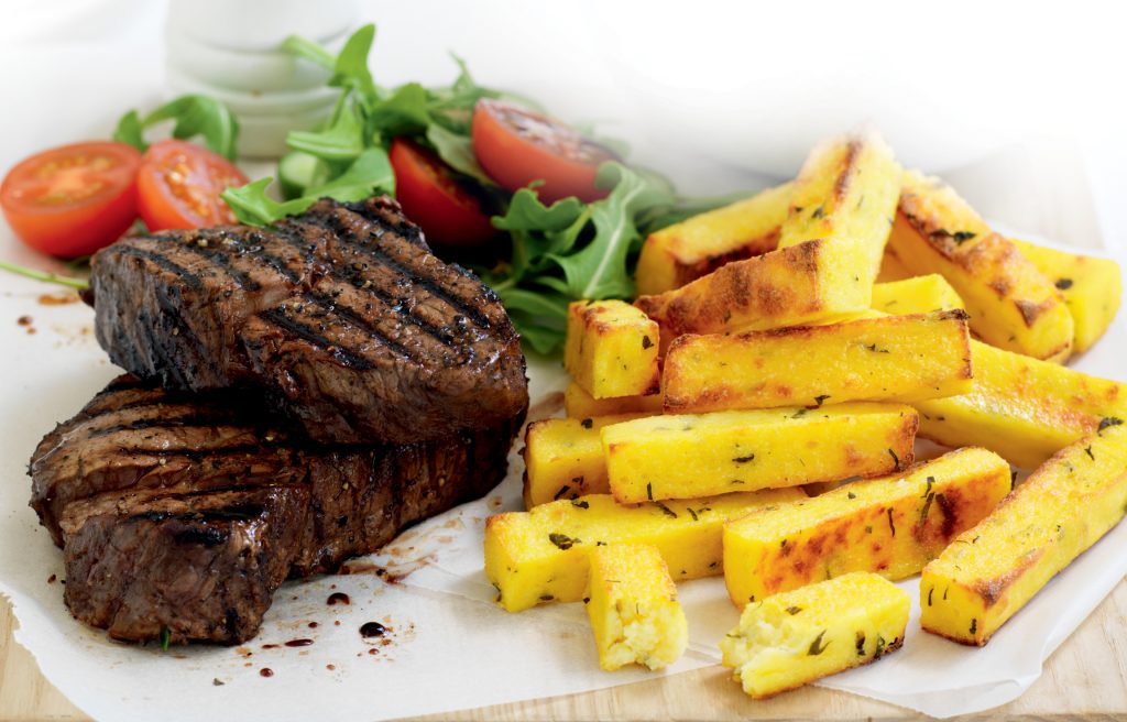 Pepper steak with herb and parmesan polenta chips Pepper steak with herb and parmesan polenta chips