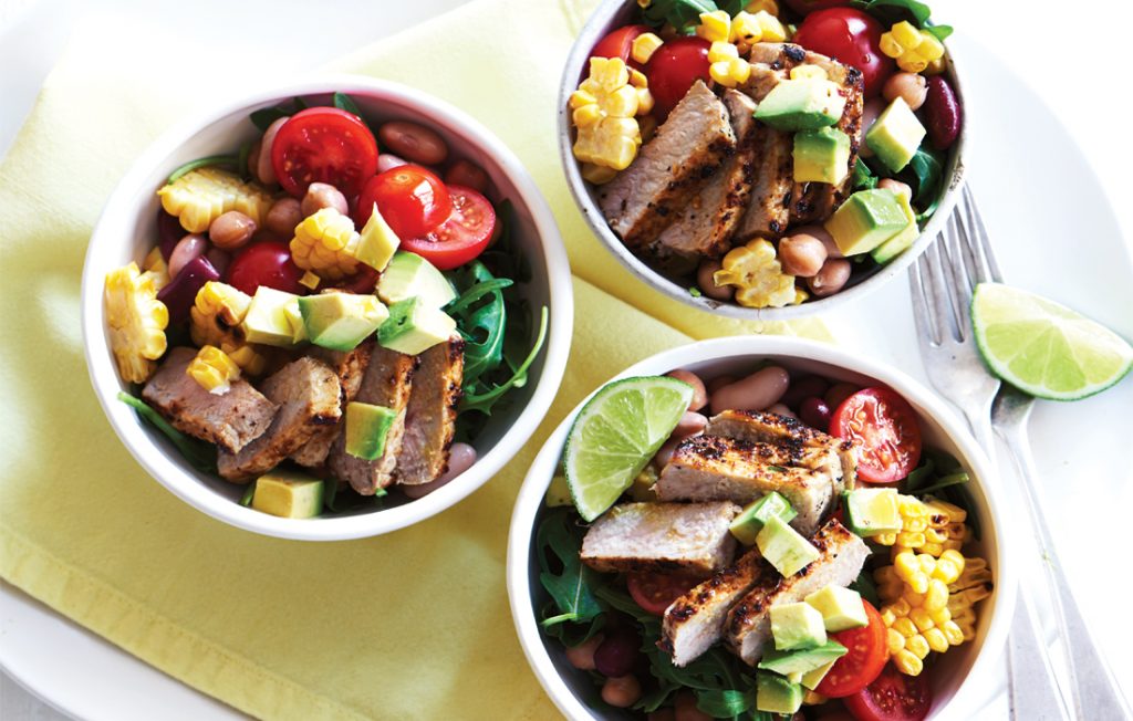 Piri piri pork with grilled corn, avocado and rocket salad Piri piri pork with grilled corn, avocado and rocket salad