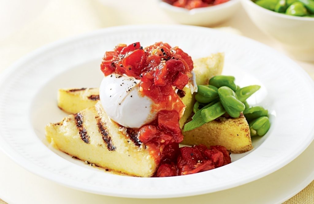 Poached egg on polenta with tomato relish