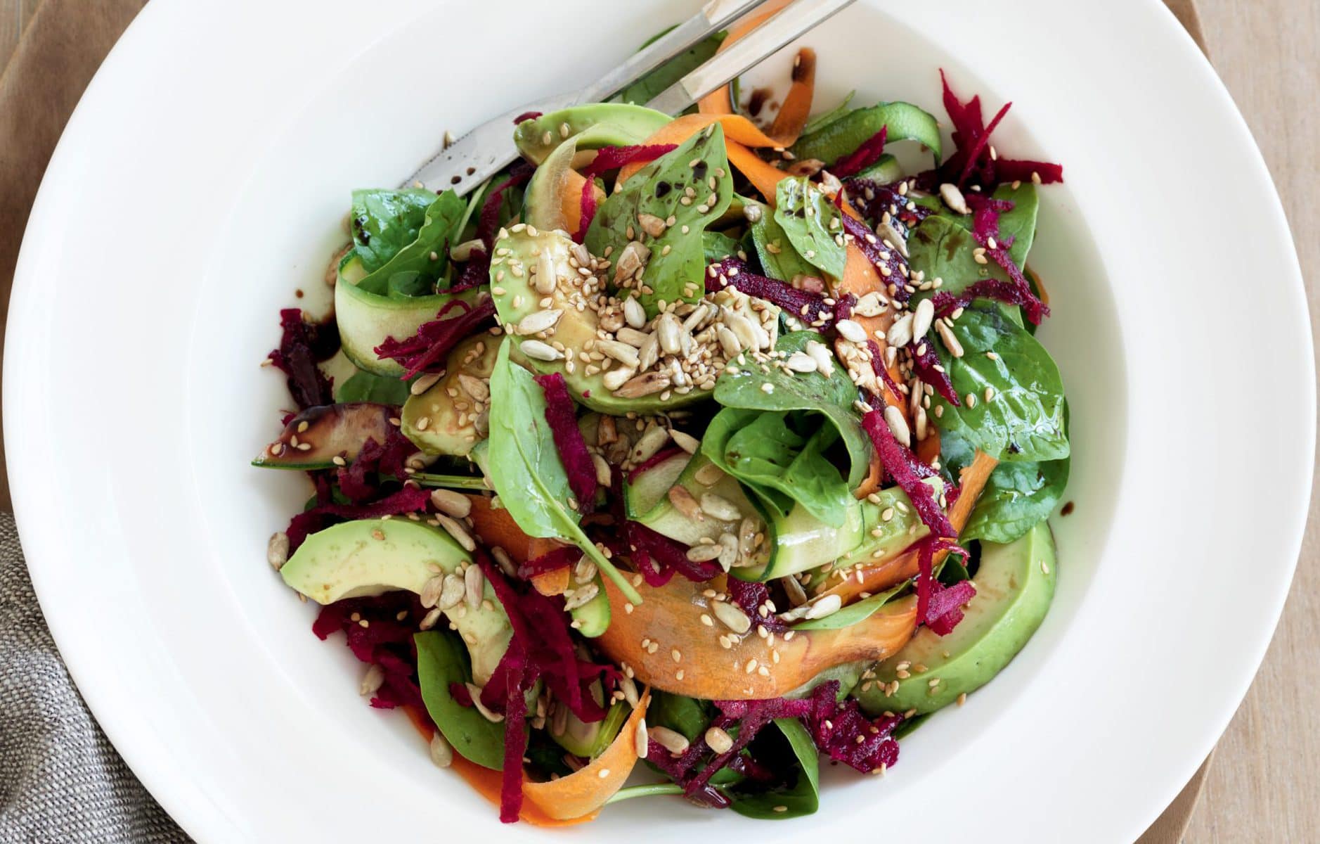Raw vege side salad with avocado and seeds