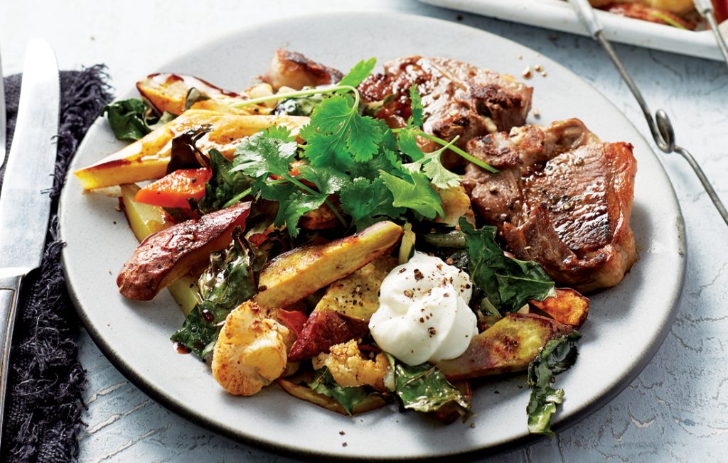 Roasted cauliflower and kumara tray bake with pomegranate dressing