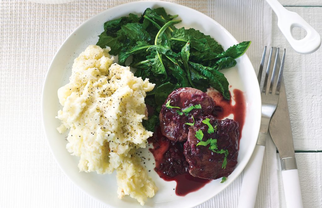 Seared venison with creamy mash and boysenberry sauce
