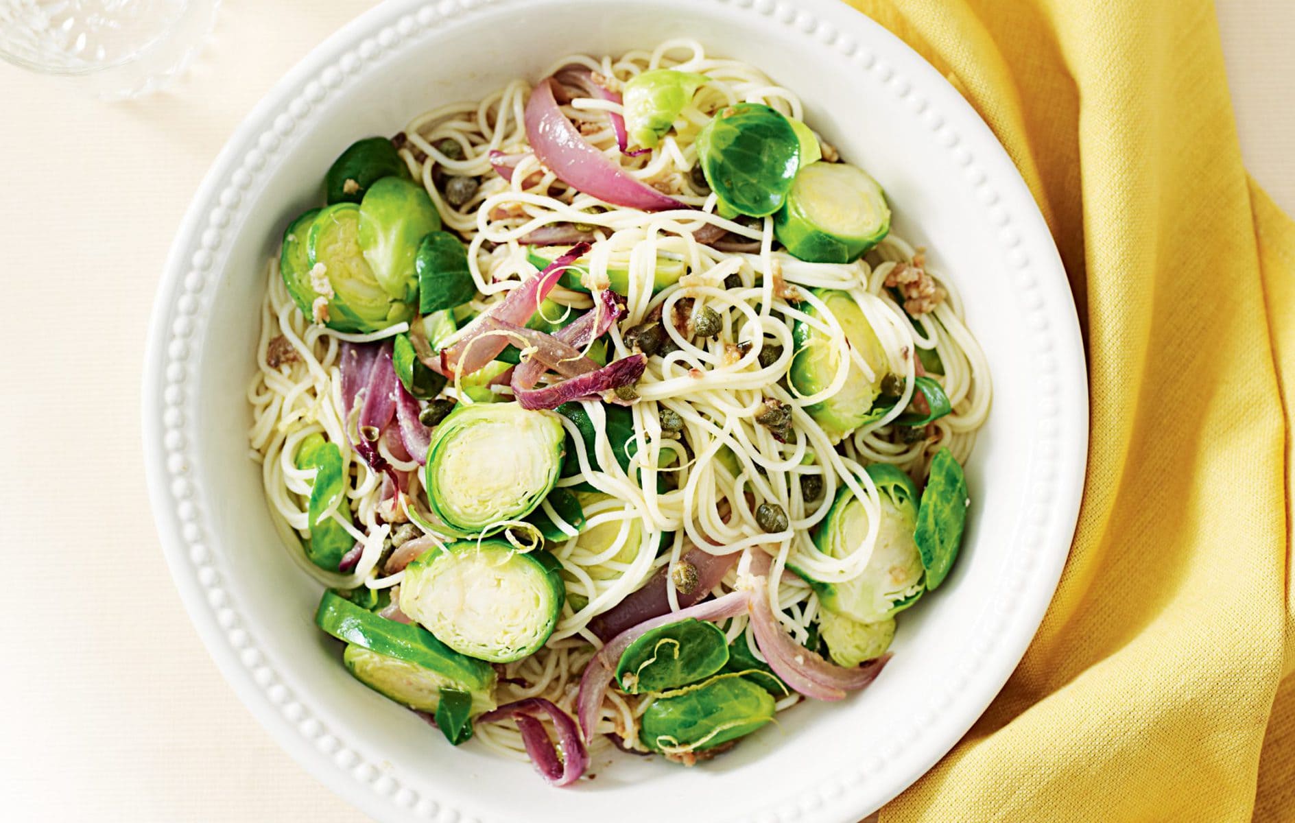 Spaghetti with capers, anchovies and Brussels sprouts