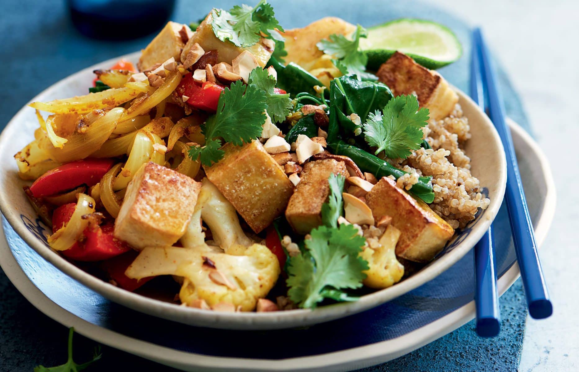 Spiced cauliflower, tofu, Chinese broccoli and cashew stir-fry
