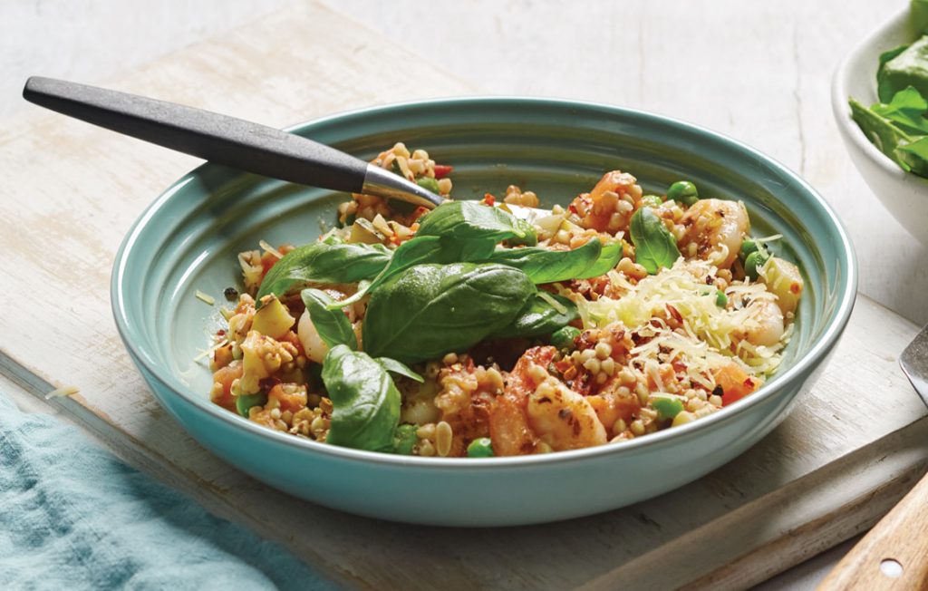 Tomato buckwheat risotto with prawns and rocket salad