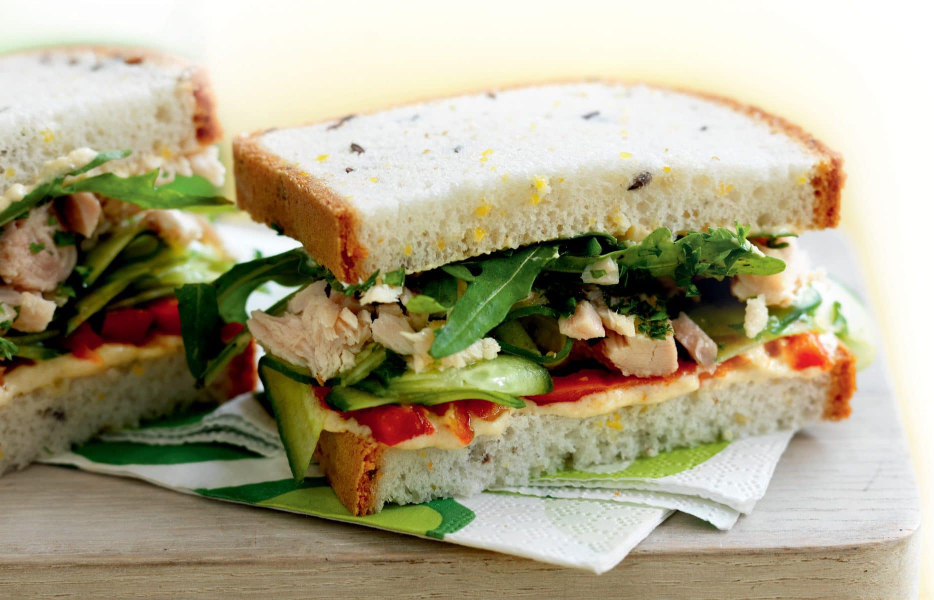 Tuna, hummus, roasted capsicum and cucumber sandwich